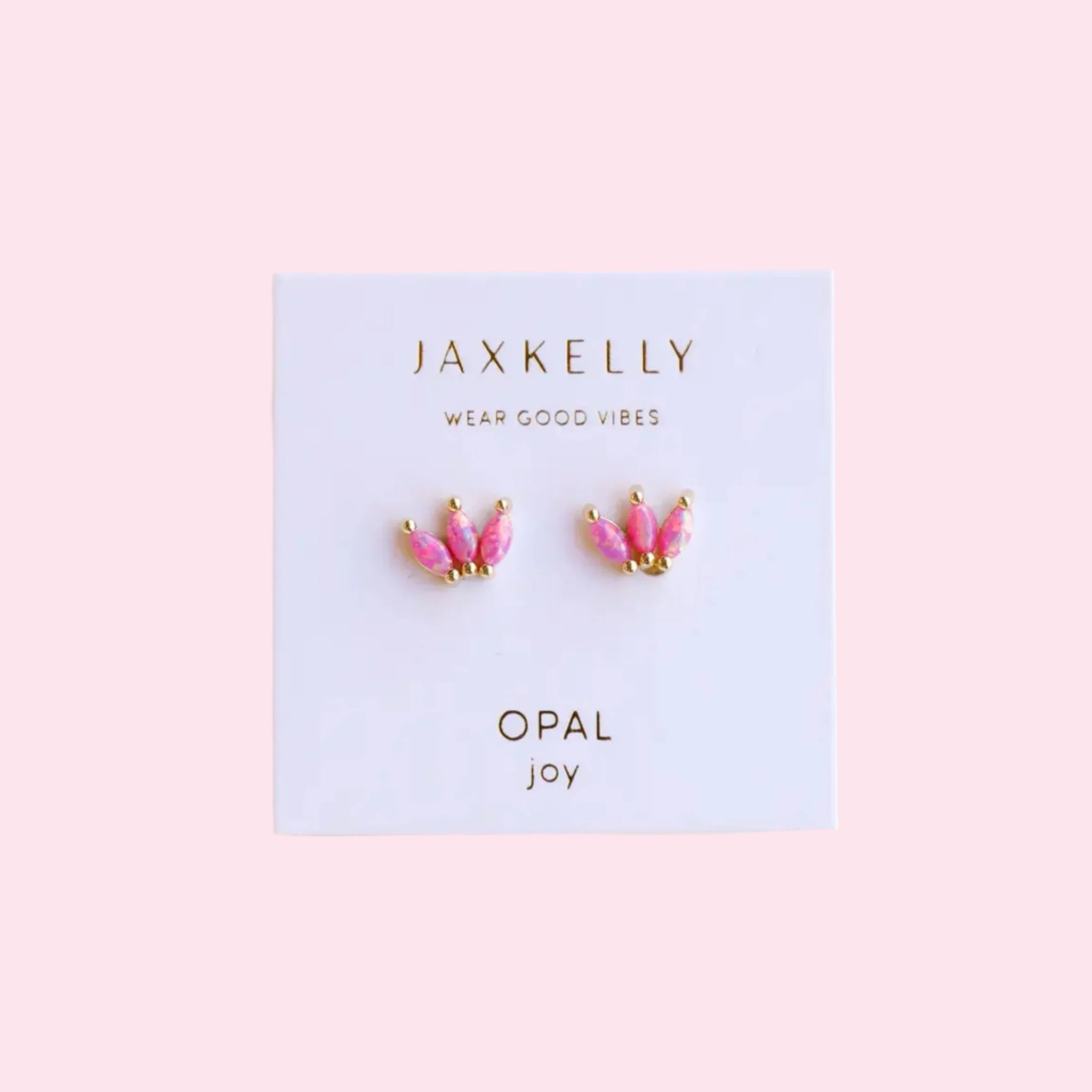 A pair of pink crown shaped stud earrings made of pink opal stones. 