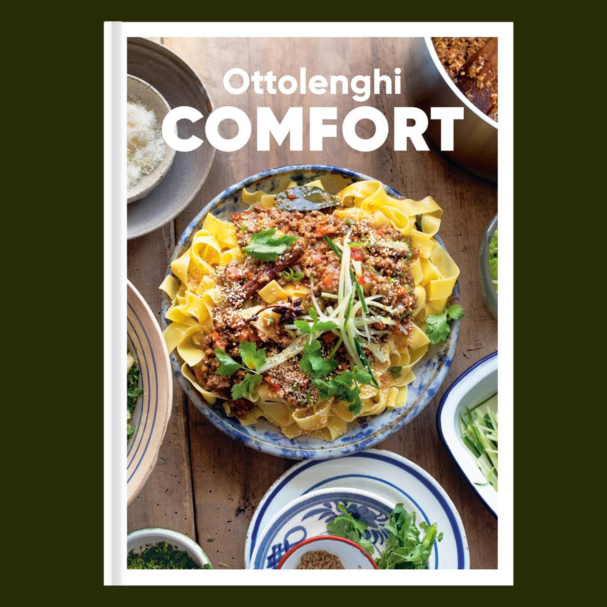 A book cover with a photo of pasta and text that reads, 'Ottolenghi Comfort'. 