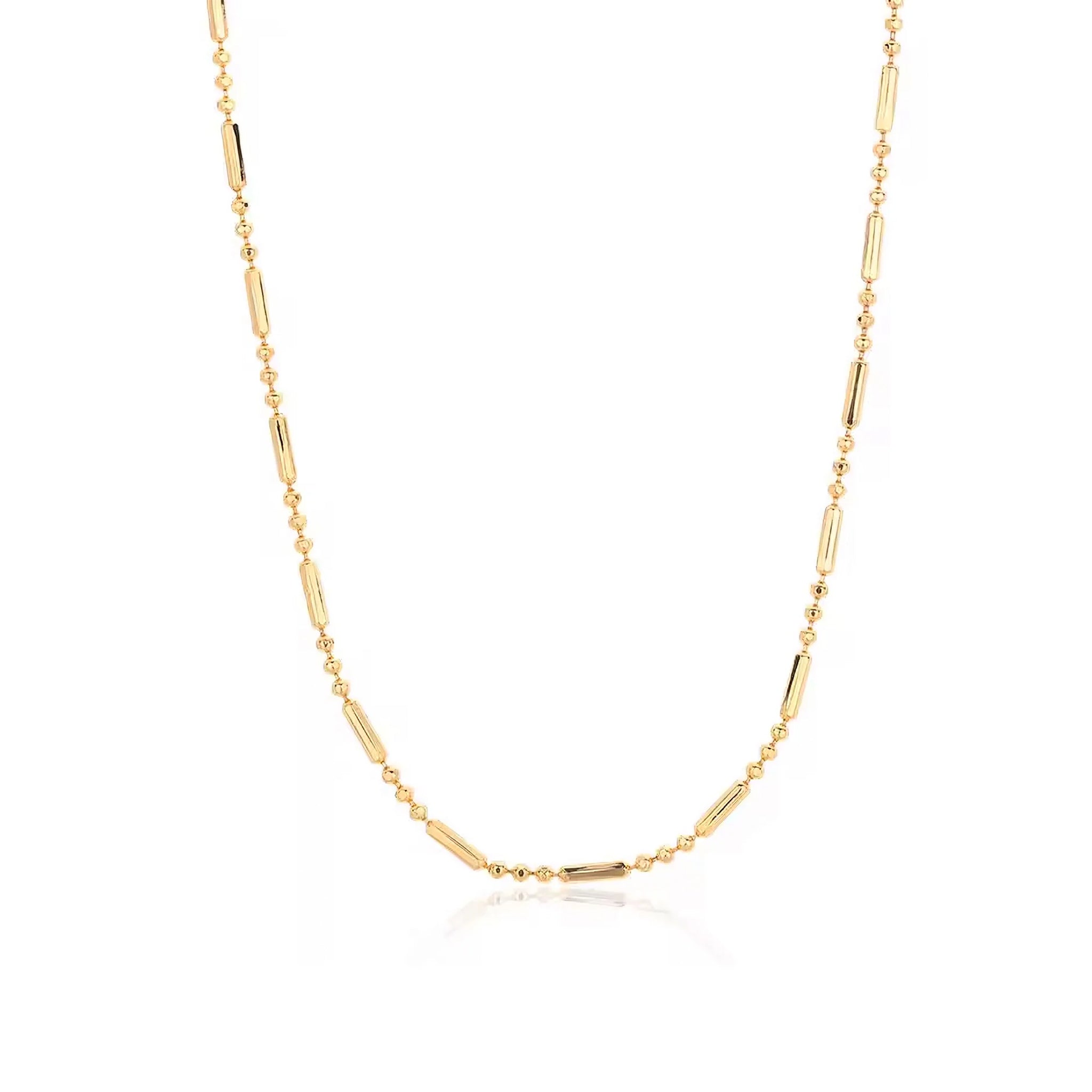 A gold beaded chain necklace. 