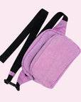 A bright pink and black fanny pack with an adjustable strap.