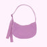 A pink nylon handbag with an adjustable strap that can go from a shoulder bag length to a crossbody. 