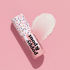 On a pink background is a pink and white lip balm and black text that reads, "poppy & pout birthday confetti cake".