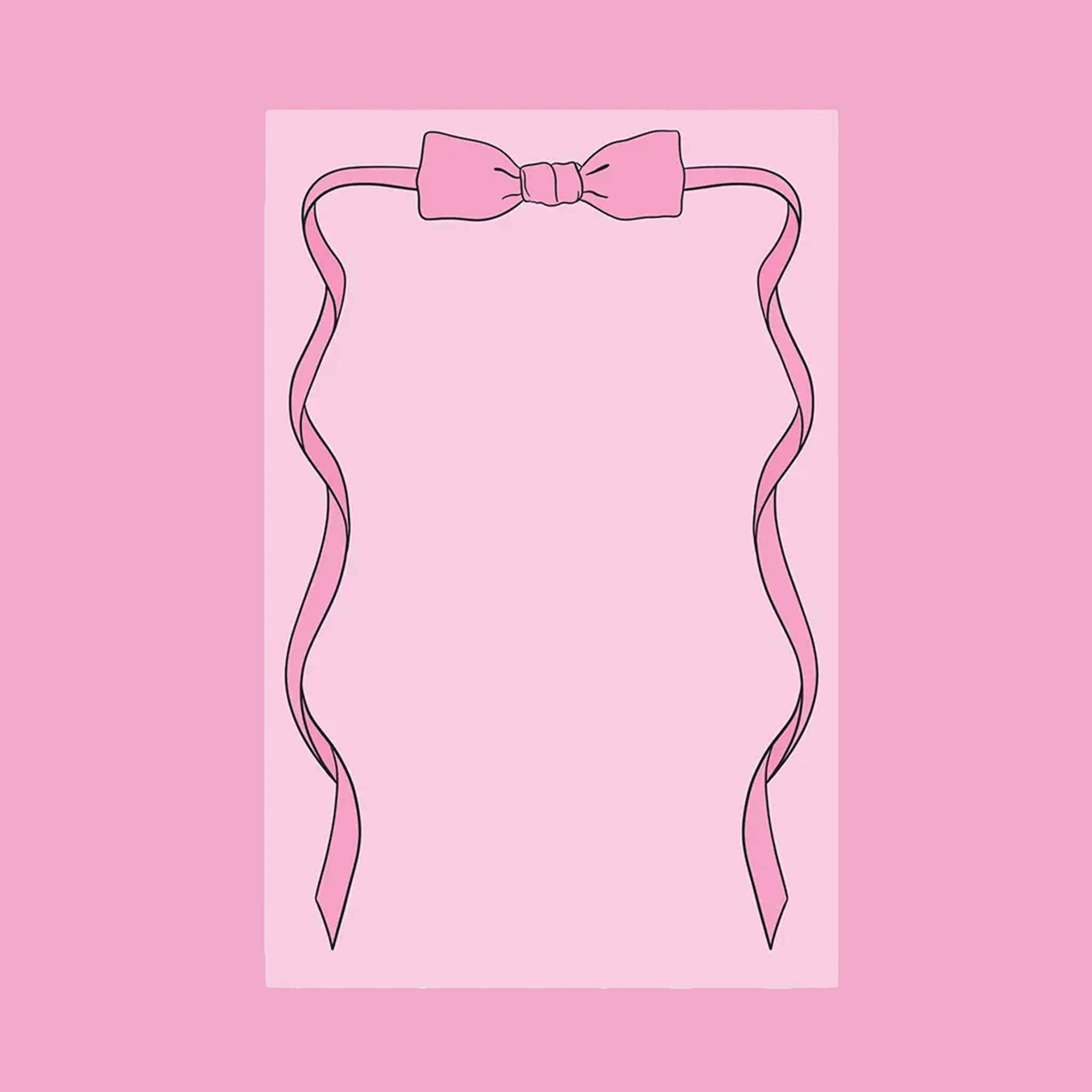 A pink notepad with bow shaped graphic on the top.