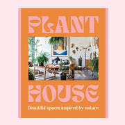 A pink and orange book cover with a photo of a plant filled interior space and text above and below that reads, 'Plant House Beautiful spaces inspired by nature'. 