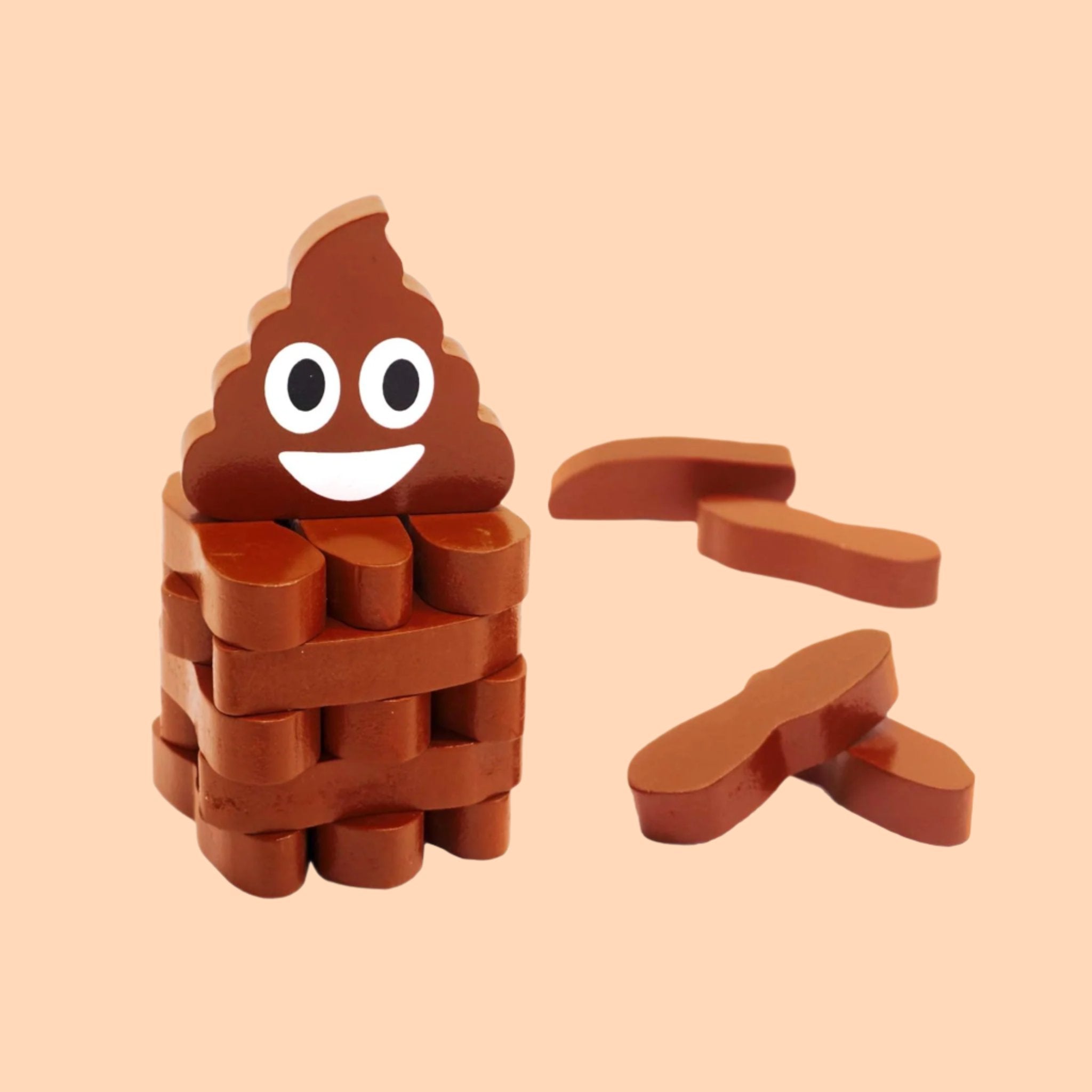 A brown wooden stacking game with a poop emoji shaped top. 