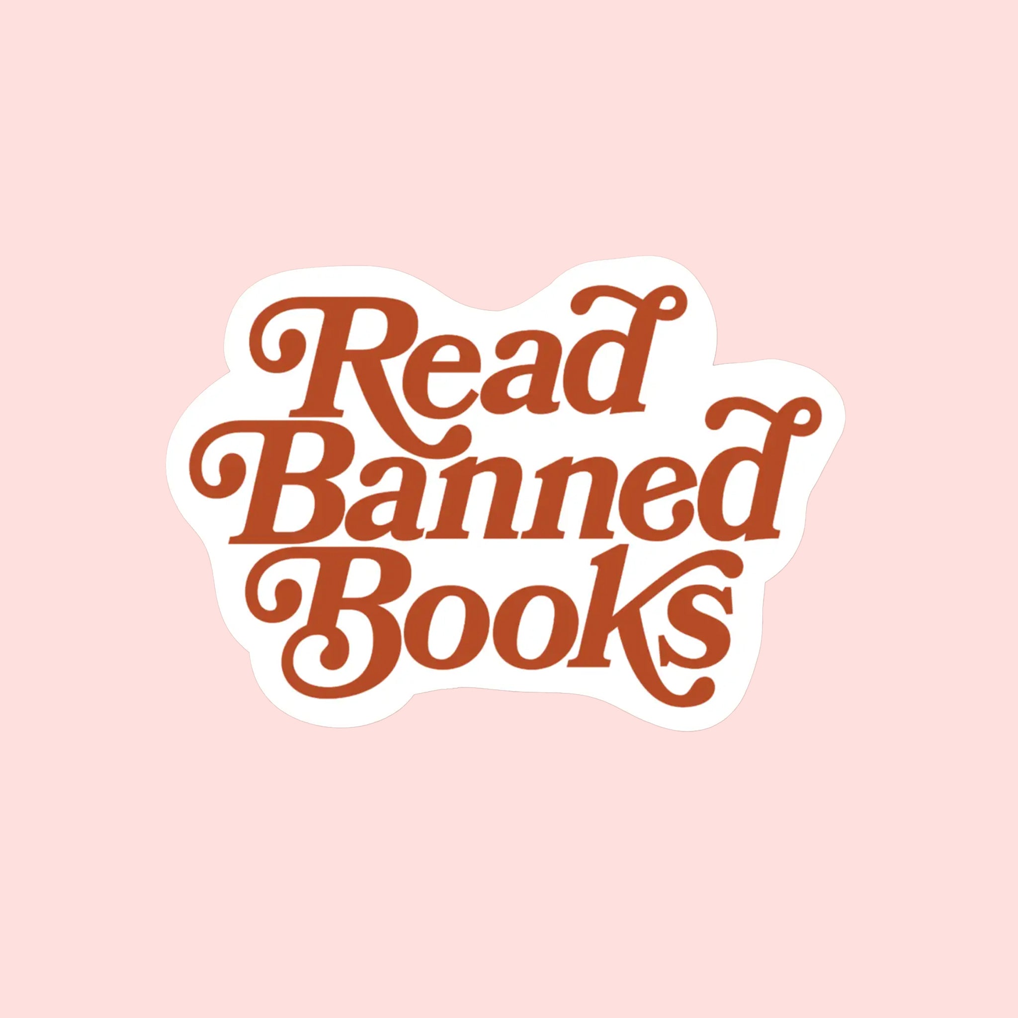 A sticker with red text that reads, &quot;Read Banned Books&quot;. 