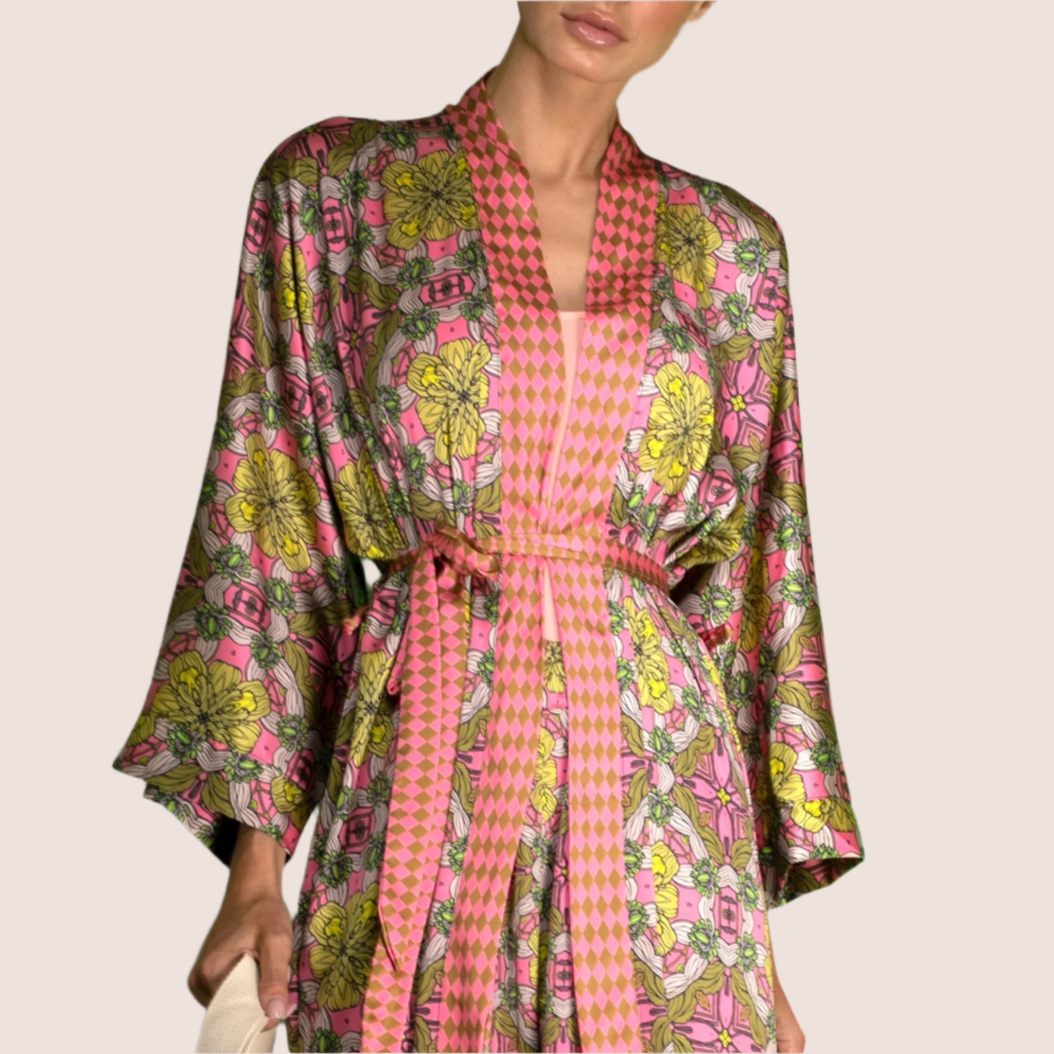 A green and pink floral satin robe. 