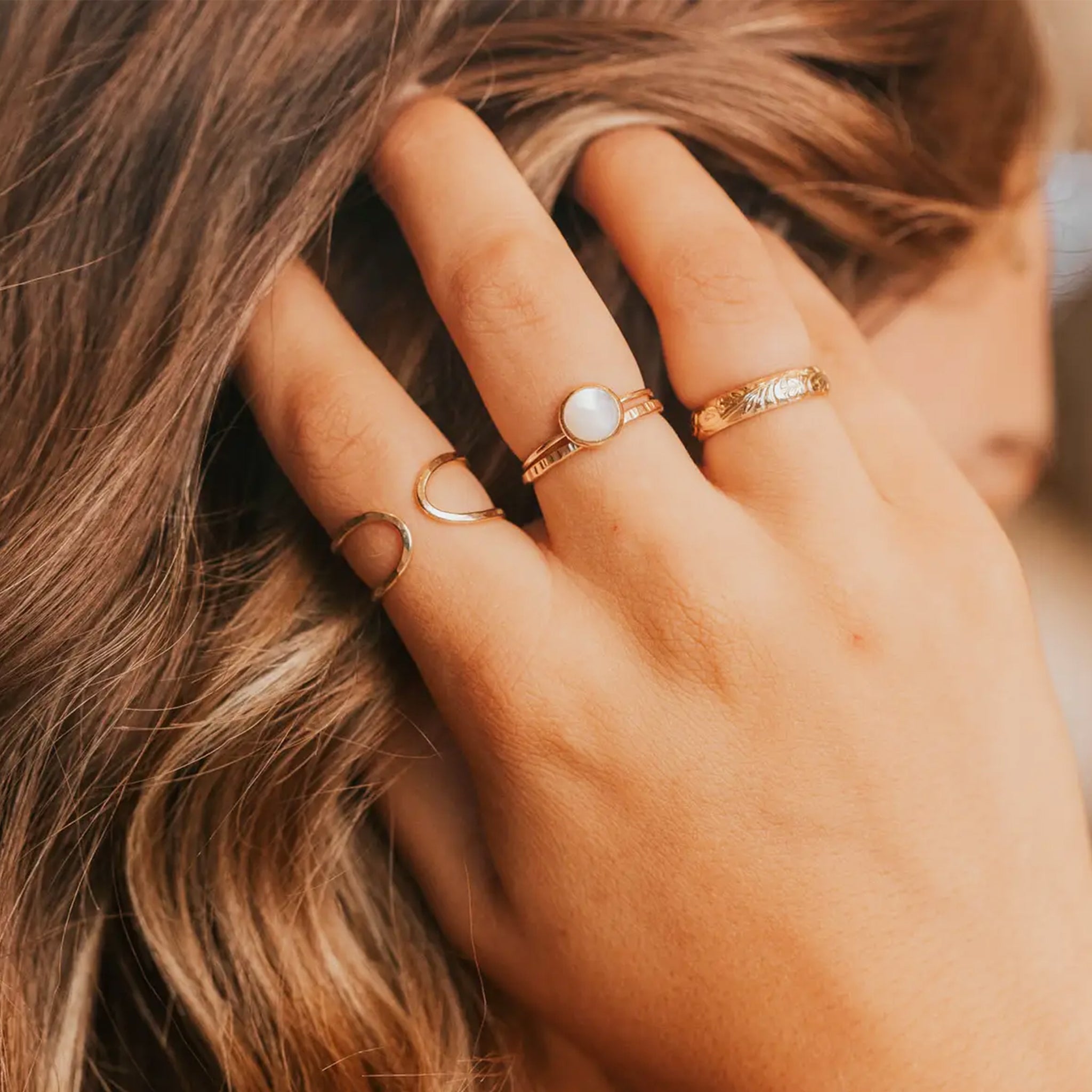 A gold slightly hammered ring. 