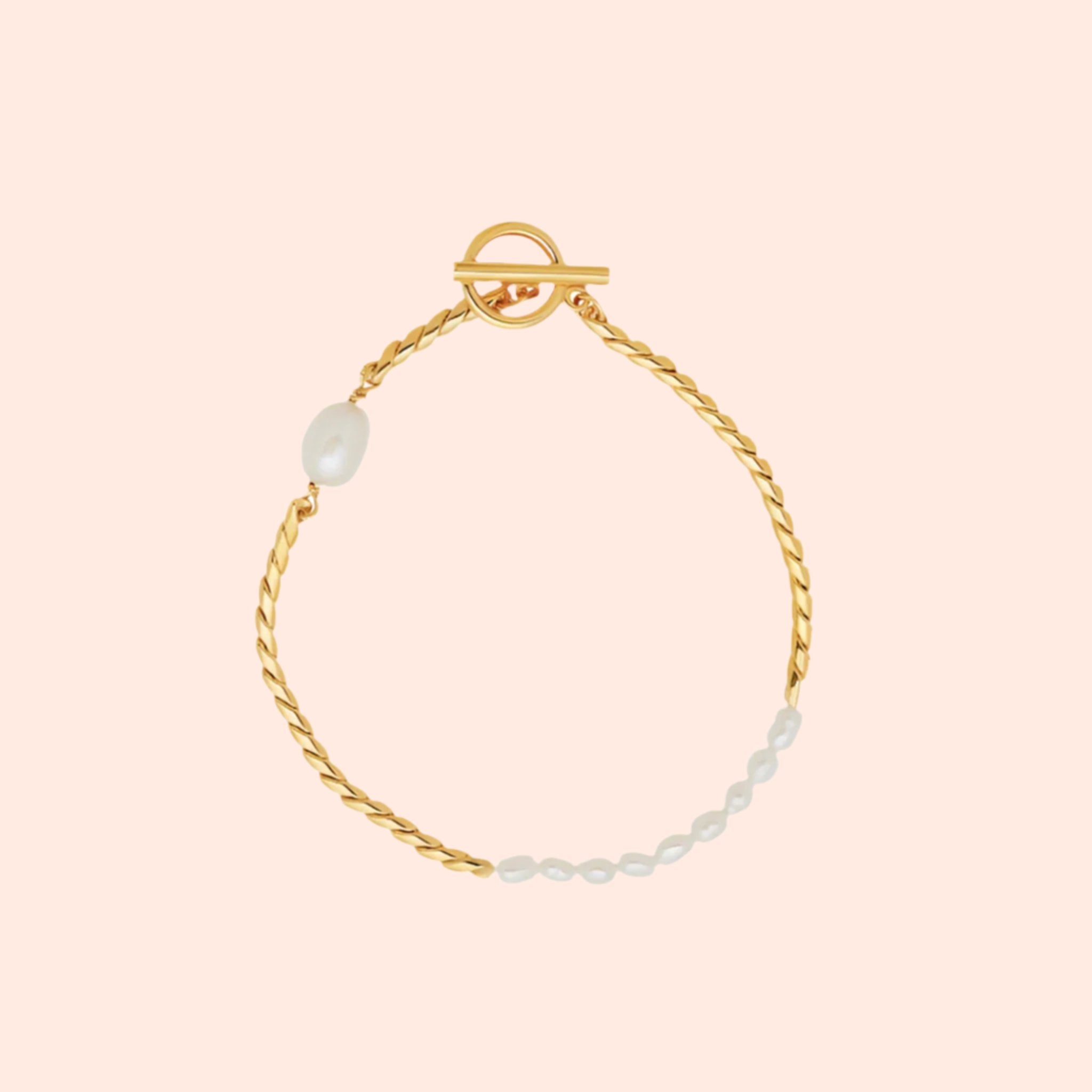 A gold and pearl bracelet. 