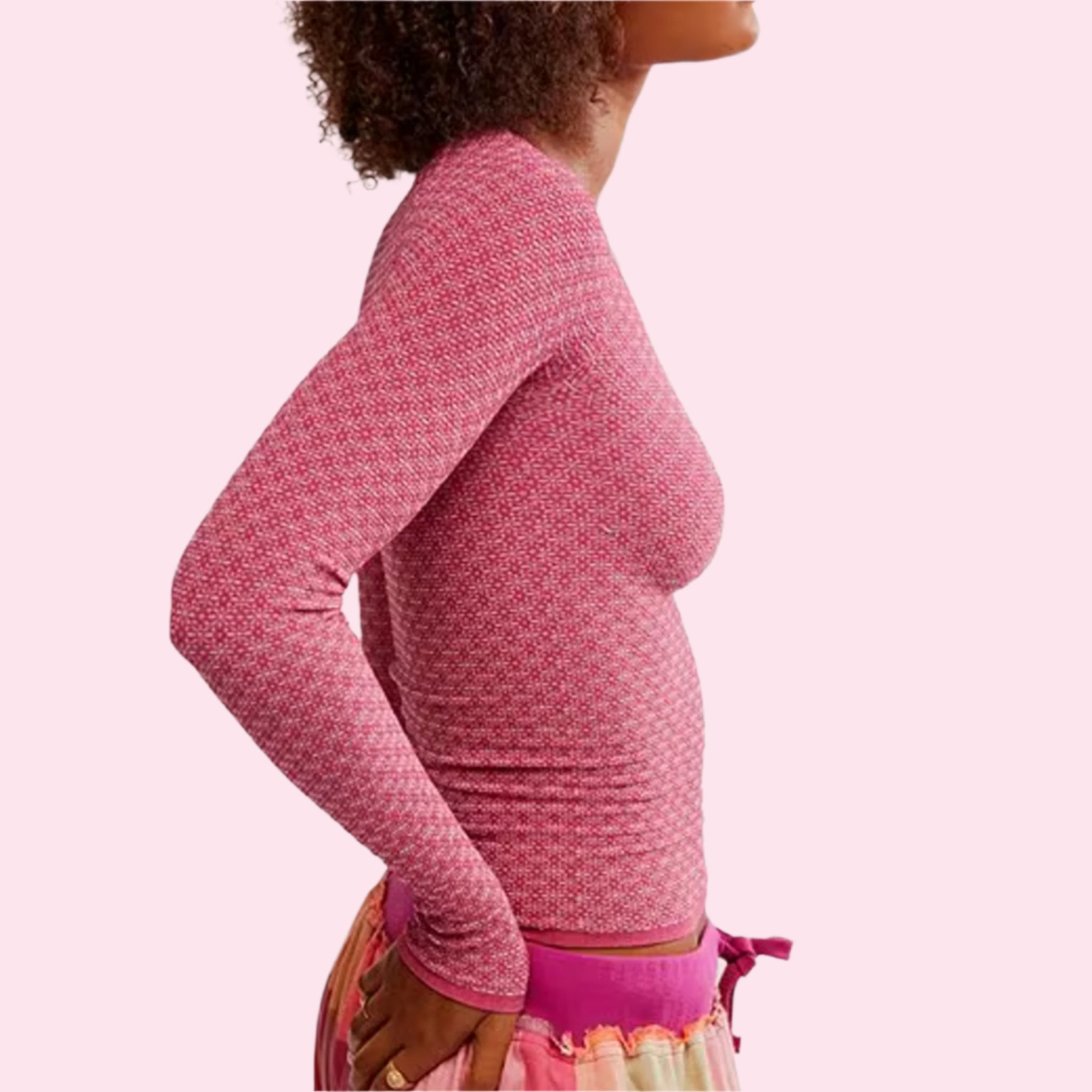 A hot pink long sleeve scoop neck shirt. 