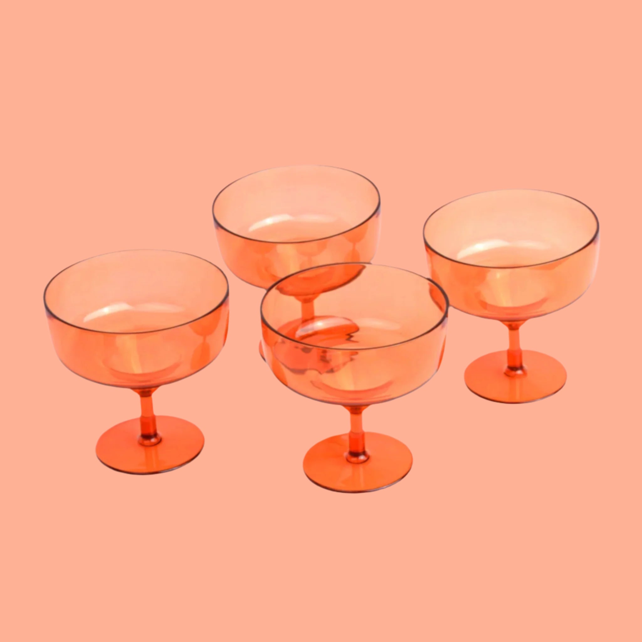 A set of four coupe glass margarita tumblers. 