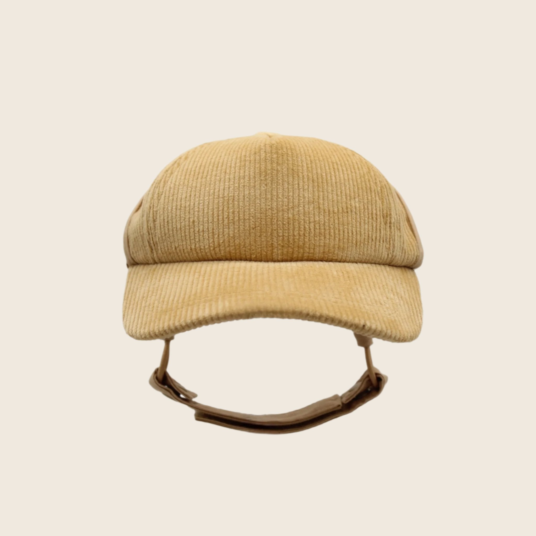 A corduroy baseball hat for pets with a chin strap for adjusting. 