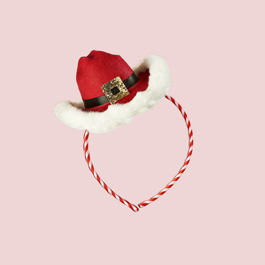 A red and white headband with a red cowboy hat shaped &quot;Santa&quot; inspired hat on top of it. 