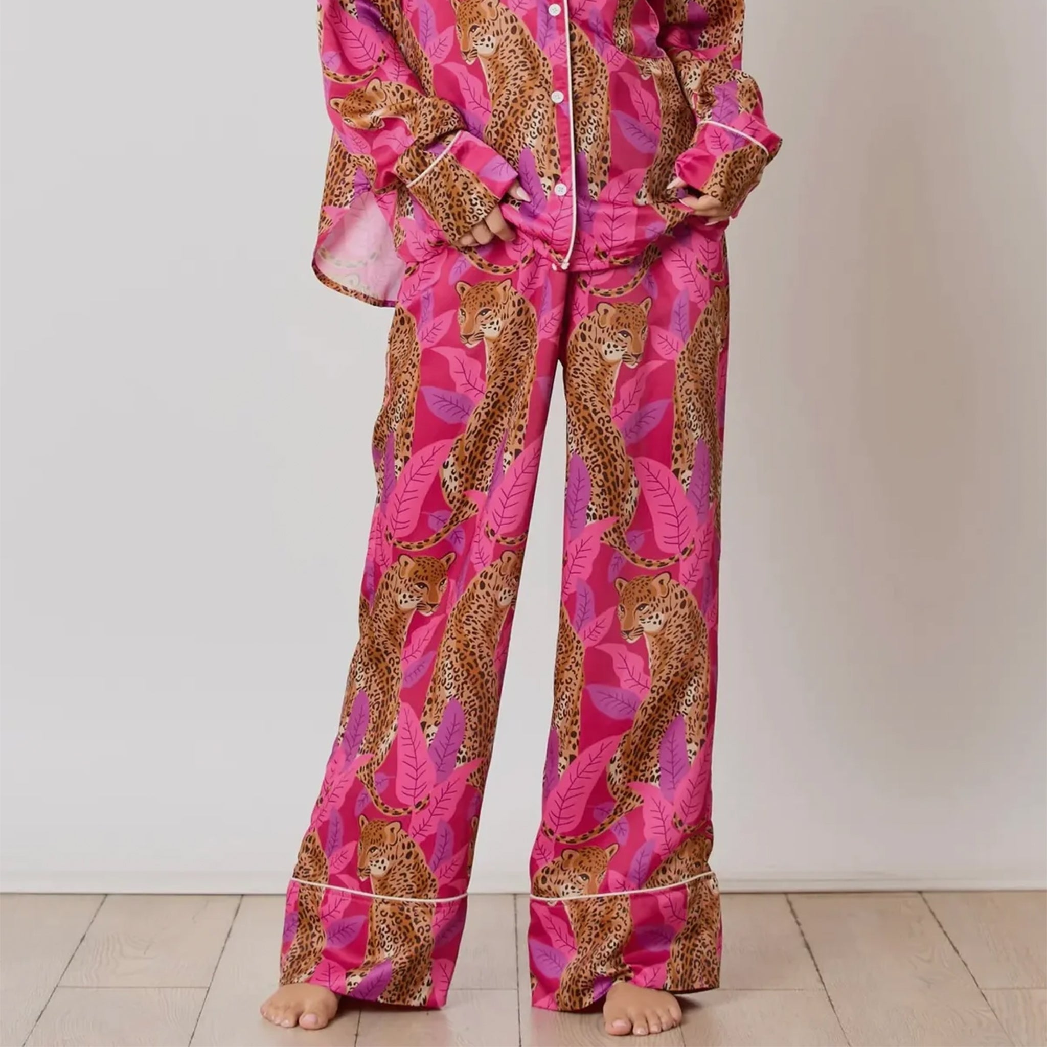 A pink cheetah print satin pajama pant.