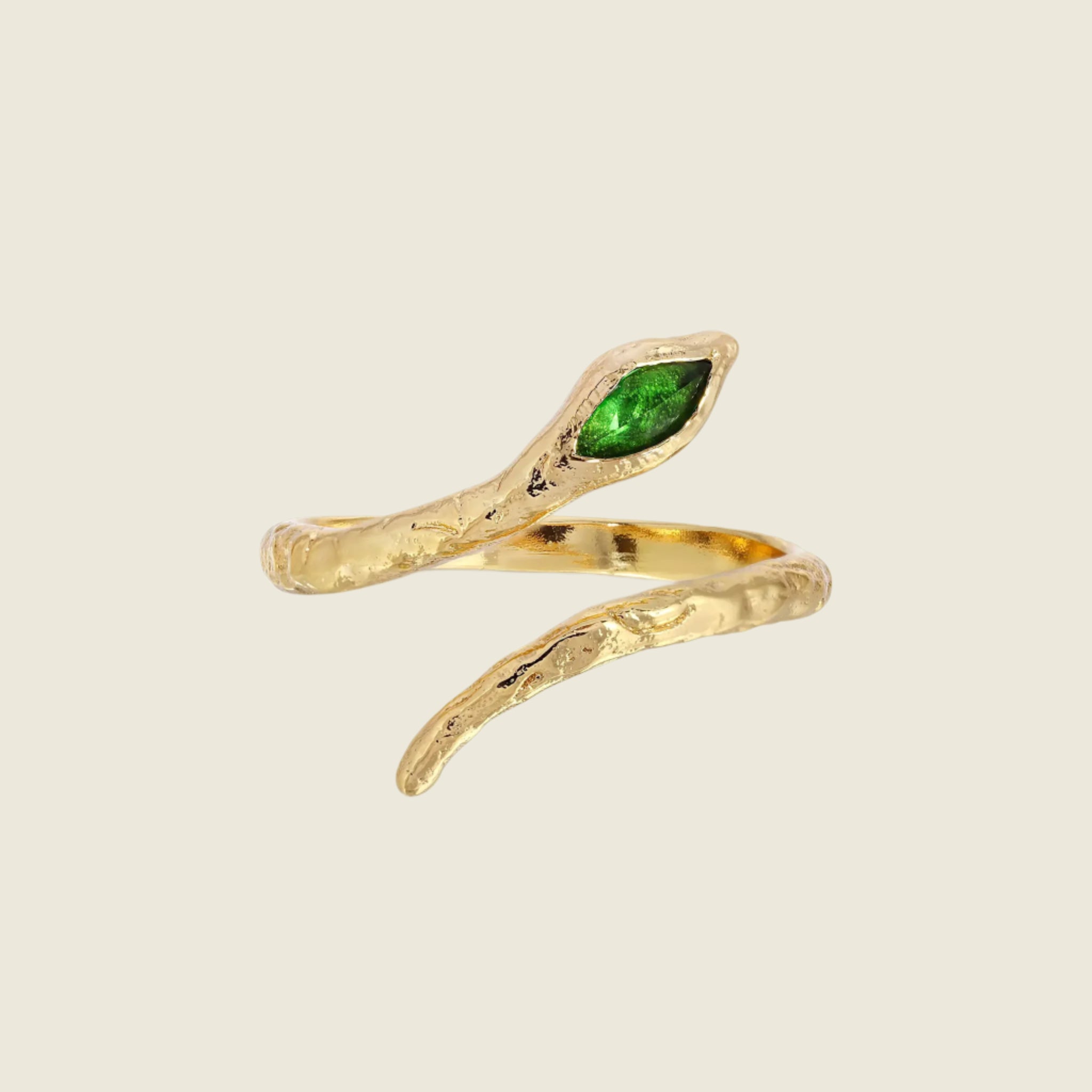 A gold snake shaped ring with a green quartz stone where the head of the snake is. 