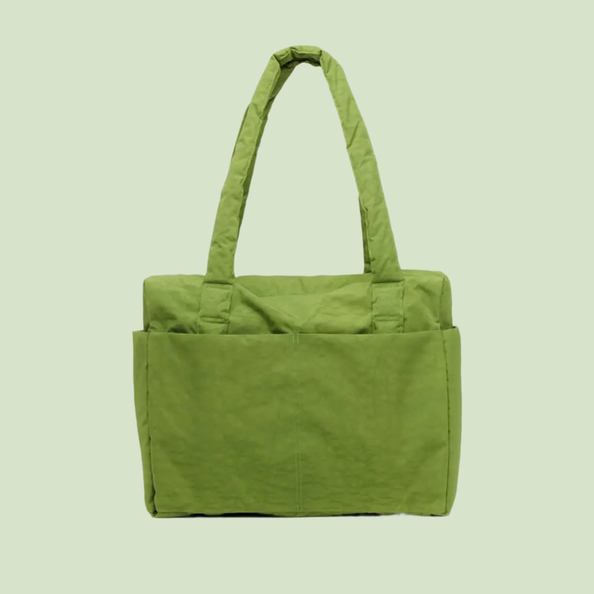 A green puffer carry on tote bag. 