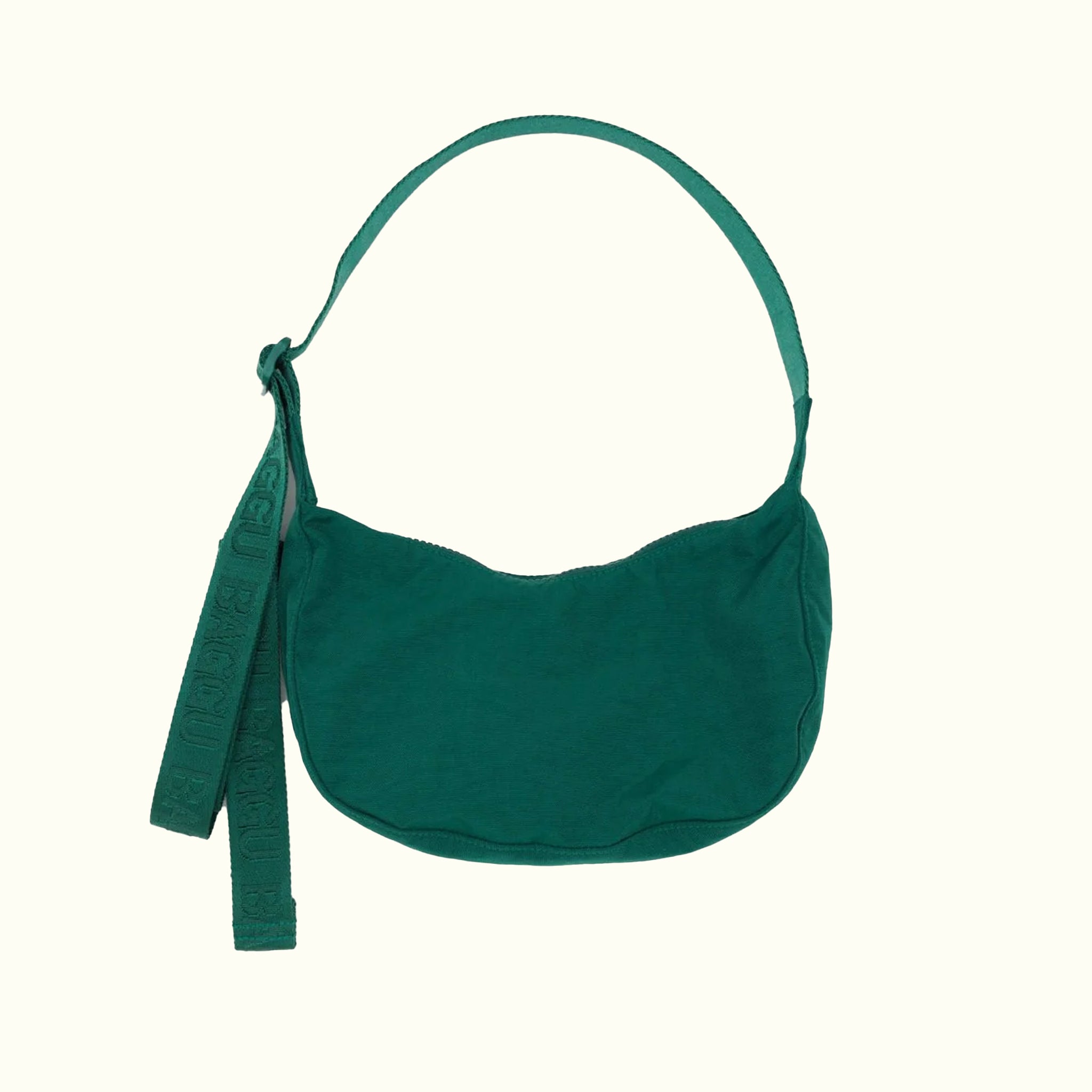 A green nylon shoulder / crossbody handbag with an adjustable strap. 