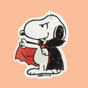 A Snoopy in a Dracula costume shaped air freshener. 