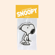 A Snoopy shaped air freshener. 