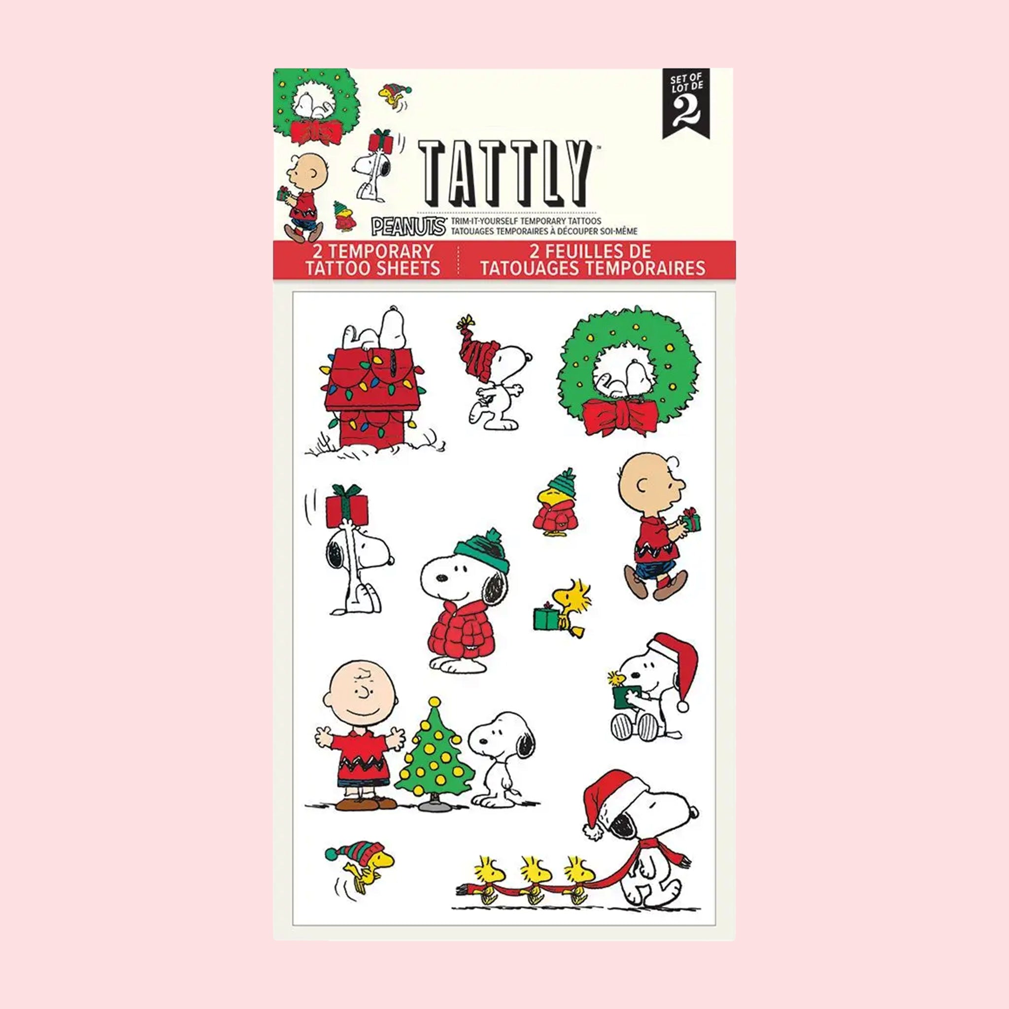 A sheet of temporary tattoos with a Peanuts holiday theme. 