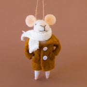 A mouse shaped ornament dressed in a large brown coat and white scarf. 