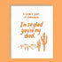 On an orange background is a white card with text on the front that reads, "I Can't Say Enough. I'm so glad you're my dad." along with an illustration of desert mountains and cacti. 