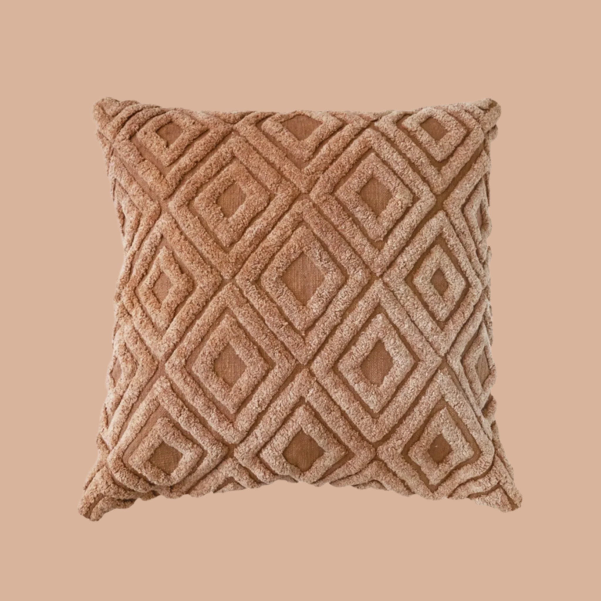 A warm brown colored square pillow with diamond textured patterns.