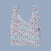A light blue nylon bag with a cherry, flower and Miffy pattern. 
