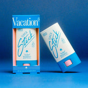 A blue and white stick sunscreen with text on the packaging that reads, 'Super Stick SPF 45 Vacation'. 