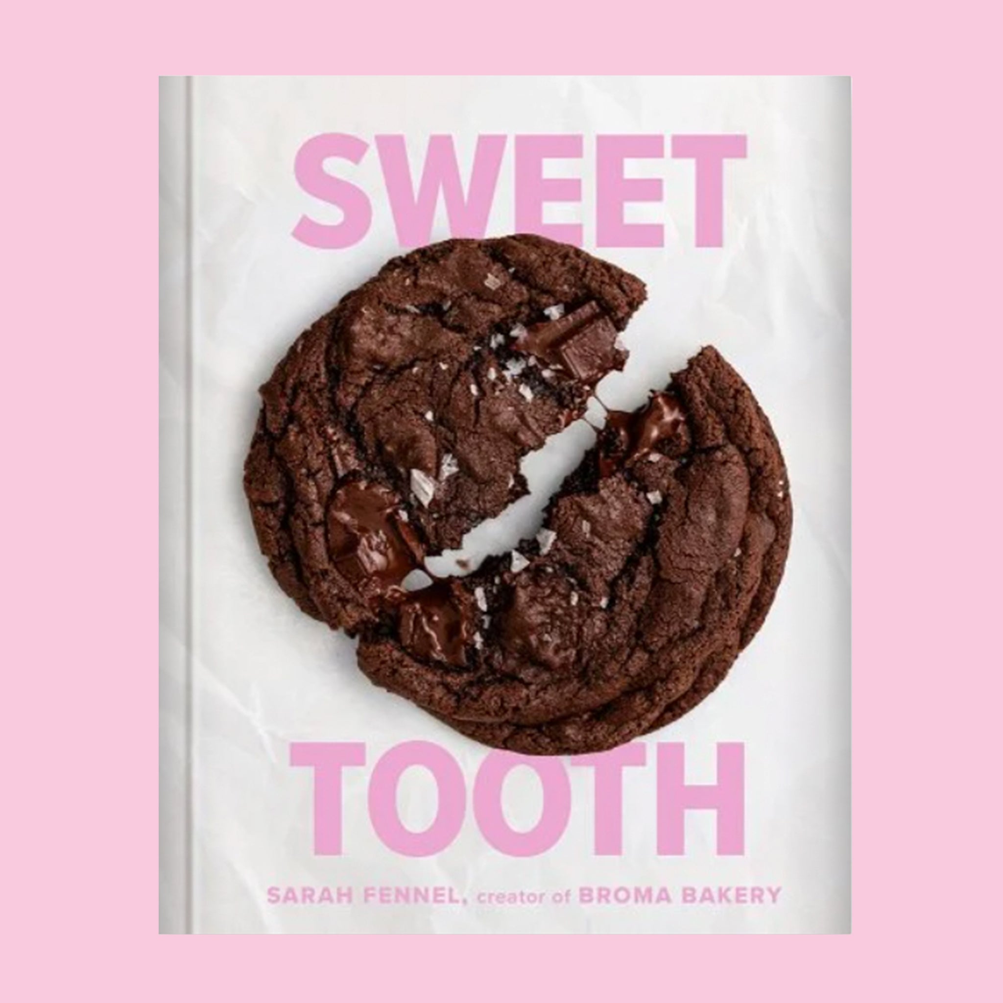 A white book cover with a chocolate cookie on the cover and pink text above and below that reads, 'Sweet Tooth'. 