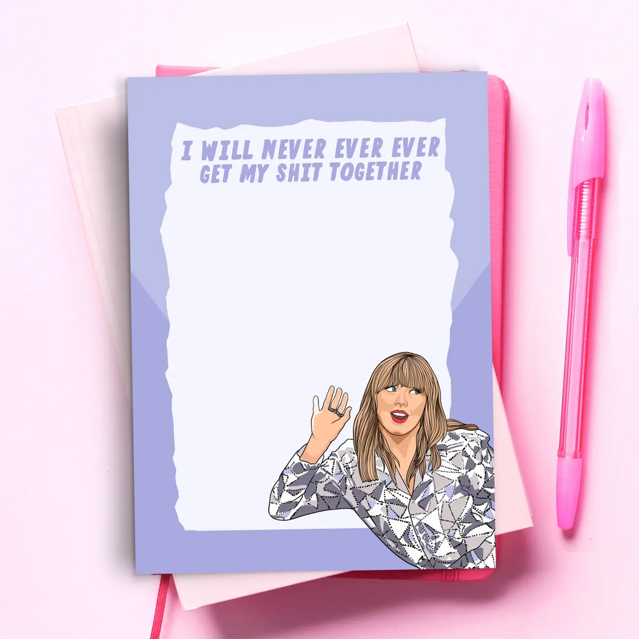 A white notepad with a purple border and text that reads, 'I will never ever ever get my shit together' along with an illustration of Taylor Swift in the bottom right corner. 