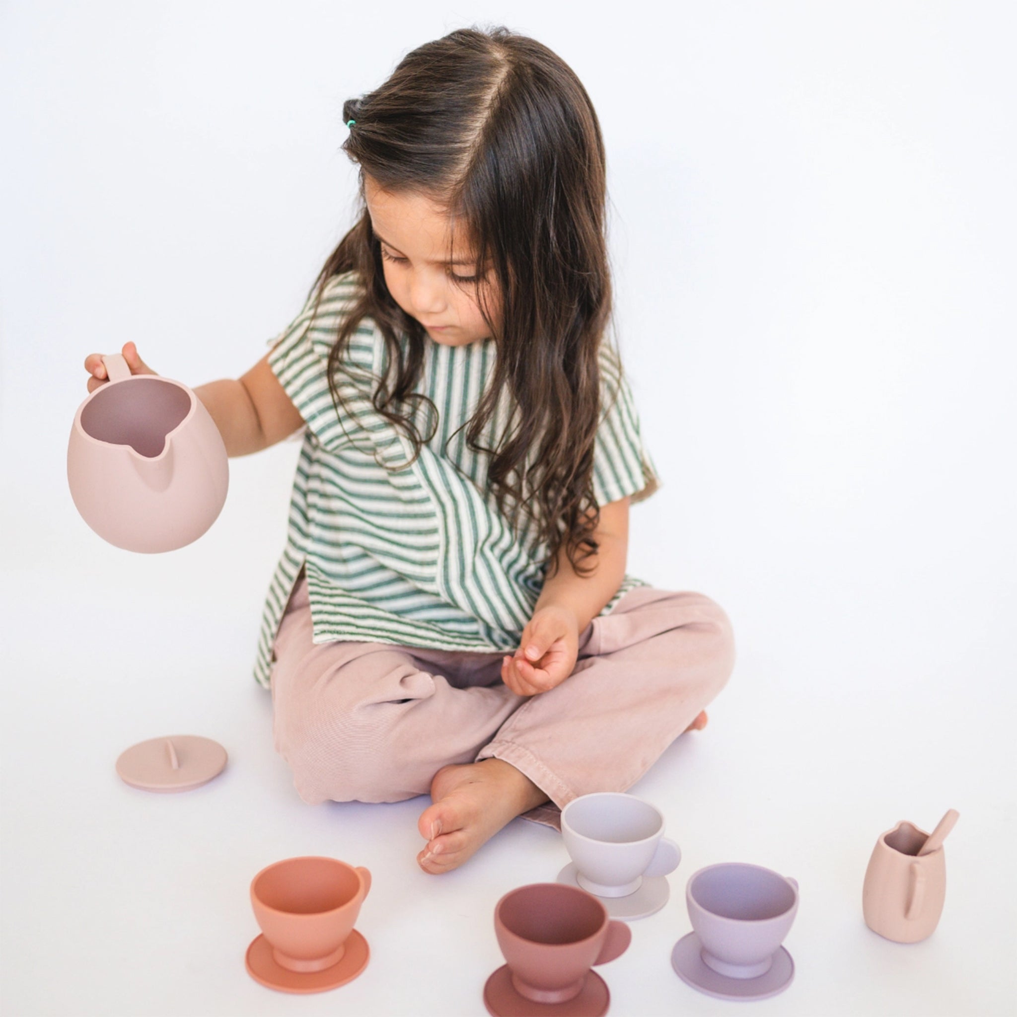 A multi colored silicone tea toy set. 