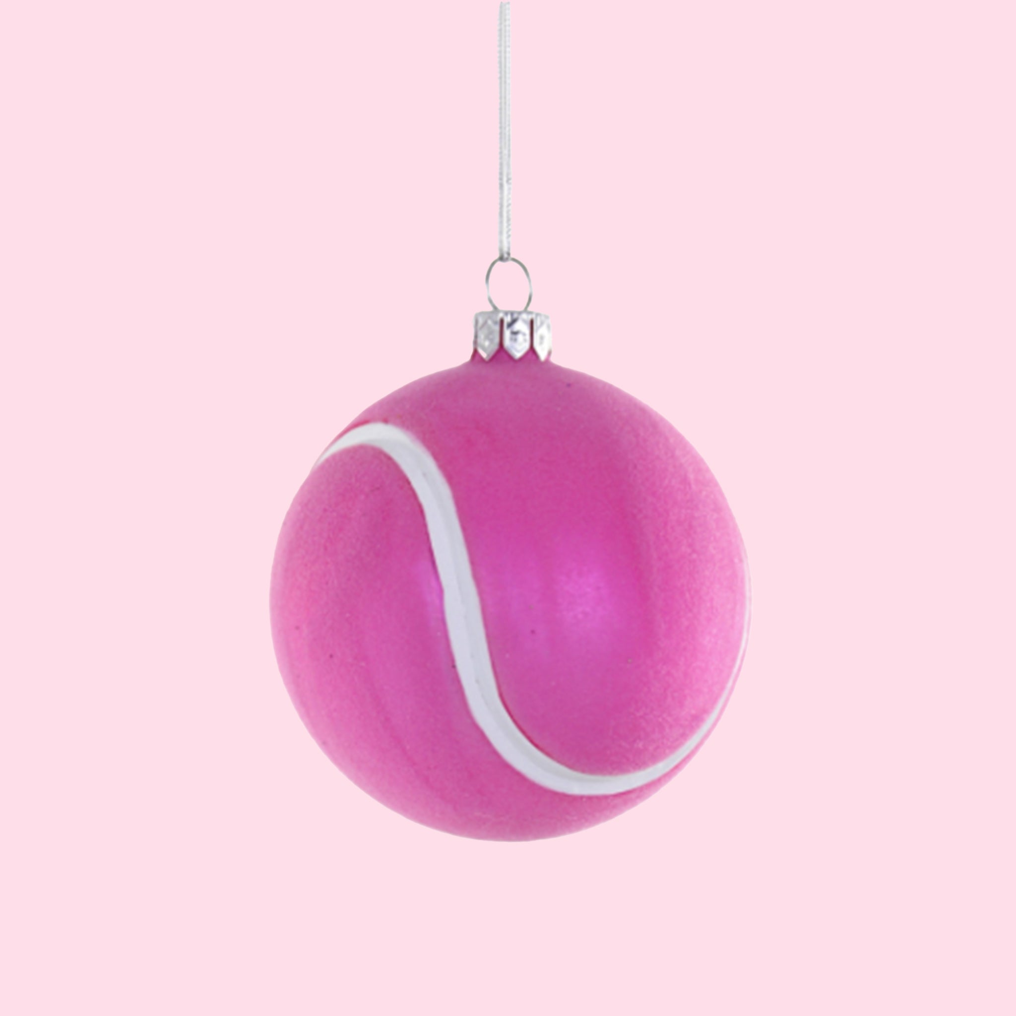 A hot pink tennis ball shaped ornament. 