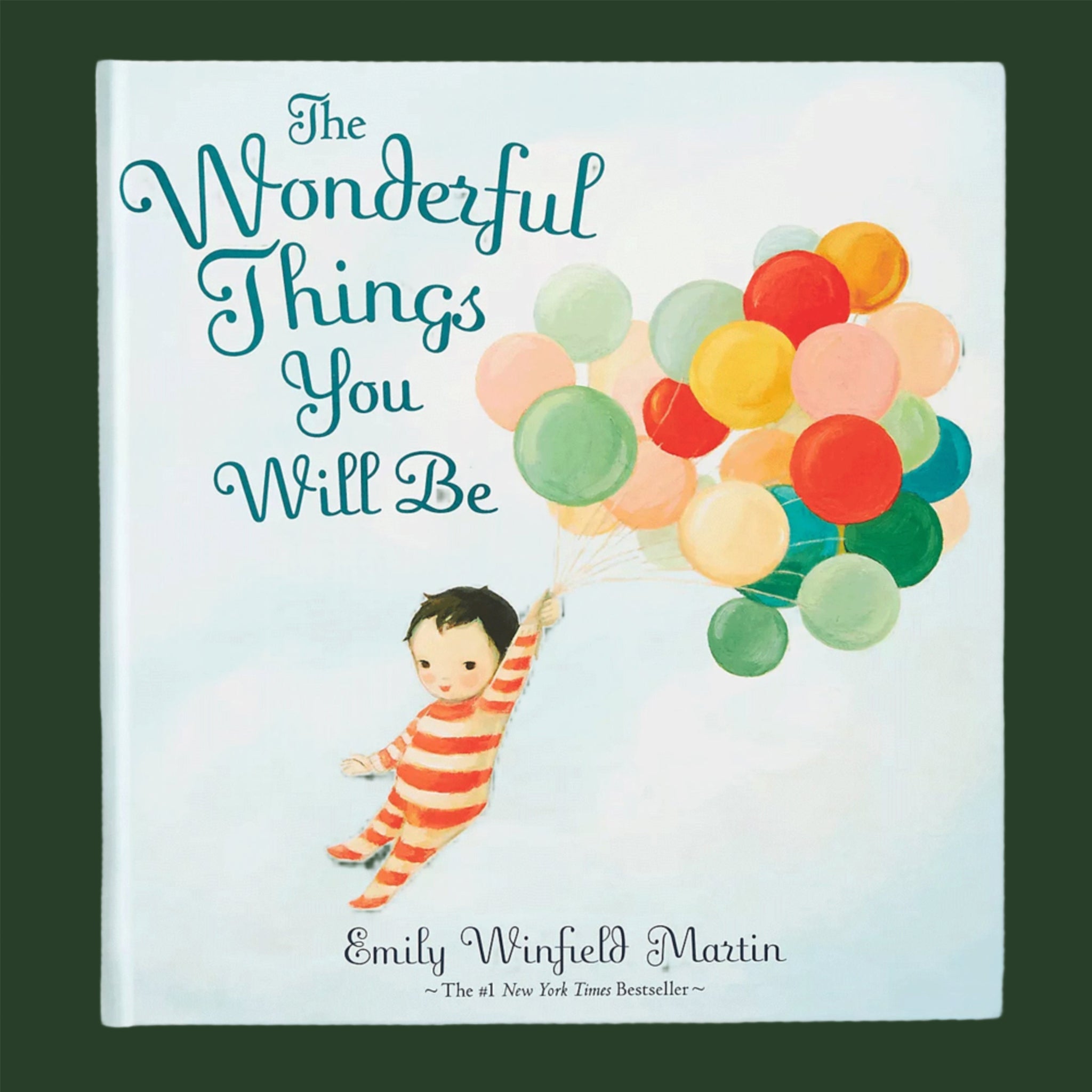 A young boy in red striped pajamas grips a bunch of colorful balloons, floating across the cover of the book. The title reads 'The Wonderful Things You Will Be' in deep teal lettering.