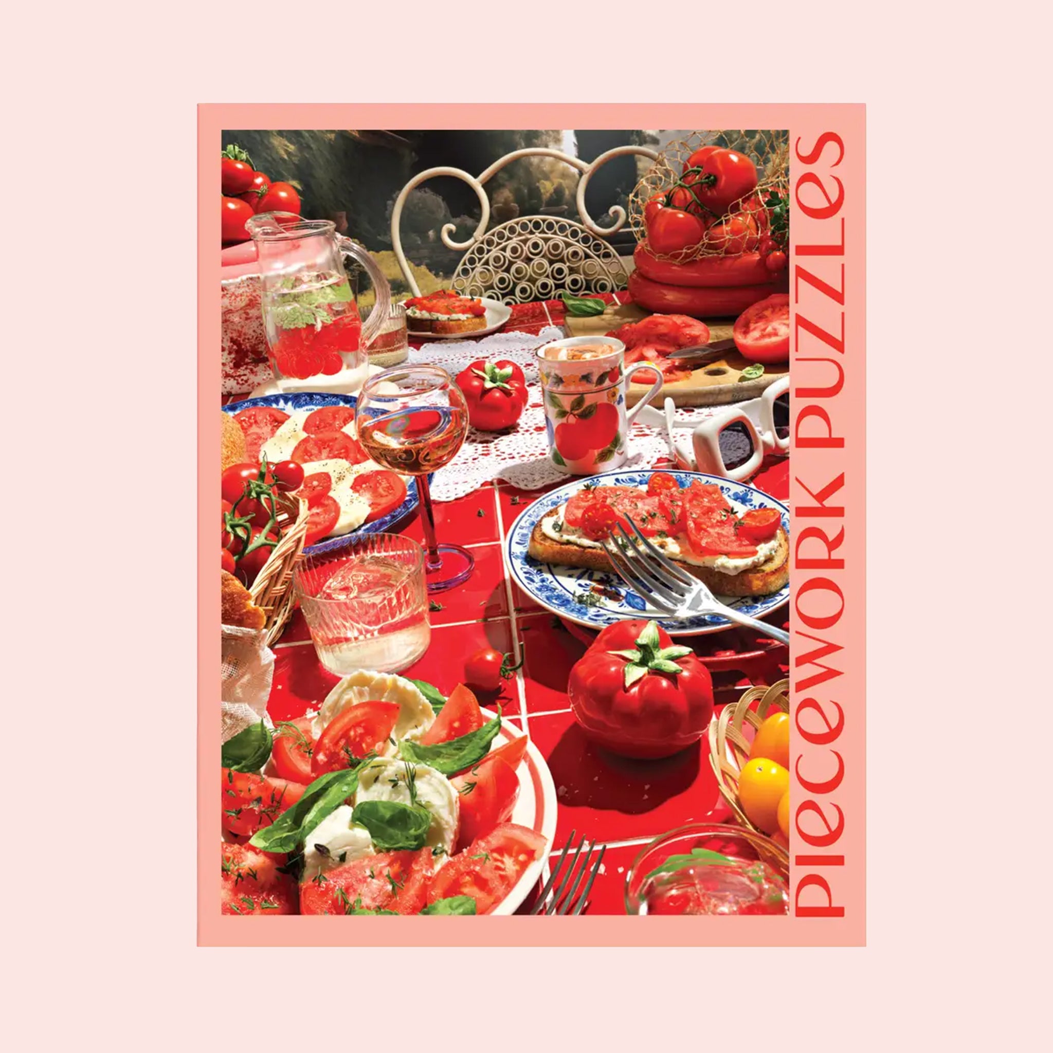 A light pink box filled with a tomato themed puzzle with beautiful red hues and imagery. 