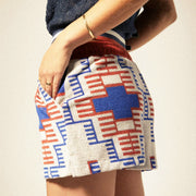 A red and blue geometric print terry cloth shorts. 