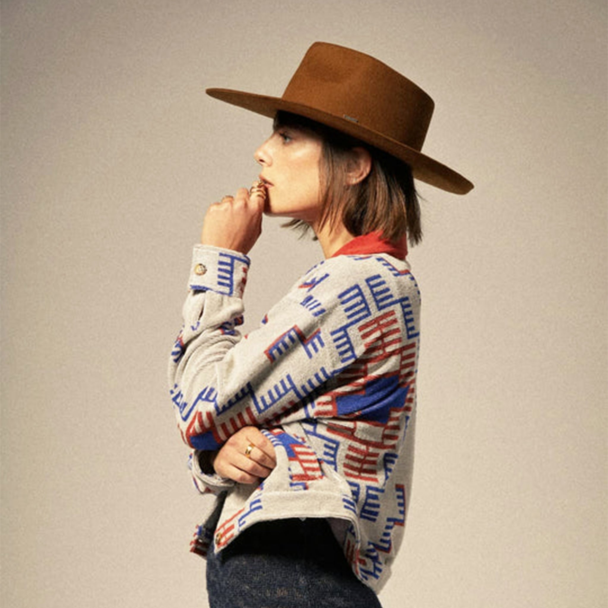 A blue and red geometric print terry cloth jacket. 