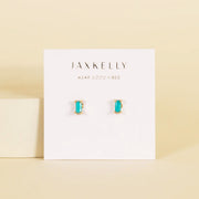 A pair of baguette shaped turquoise stone earrings. 