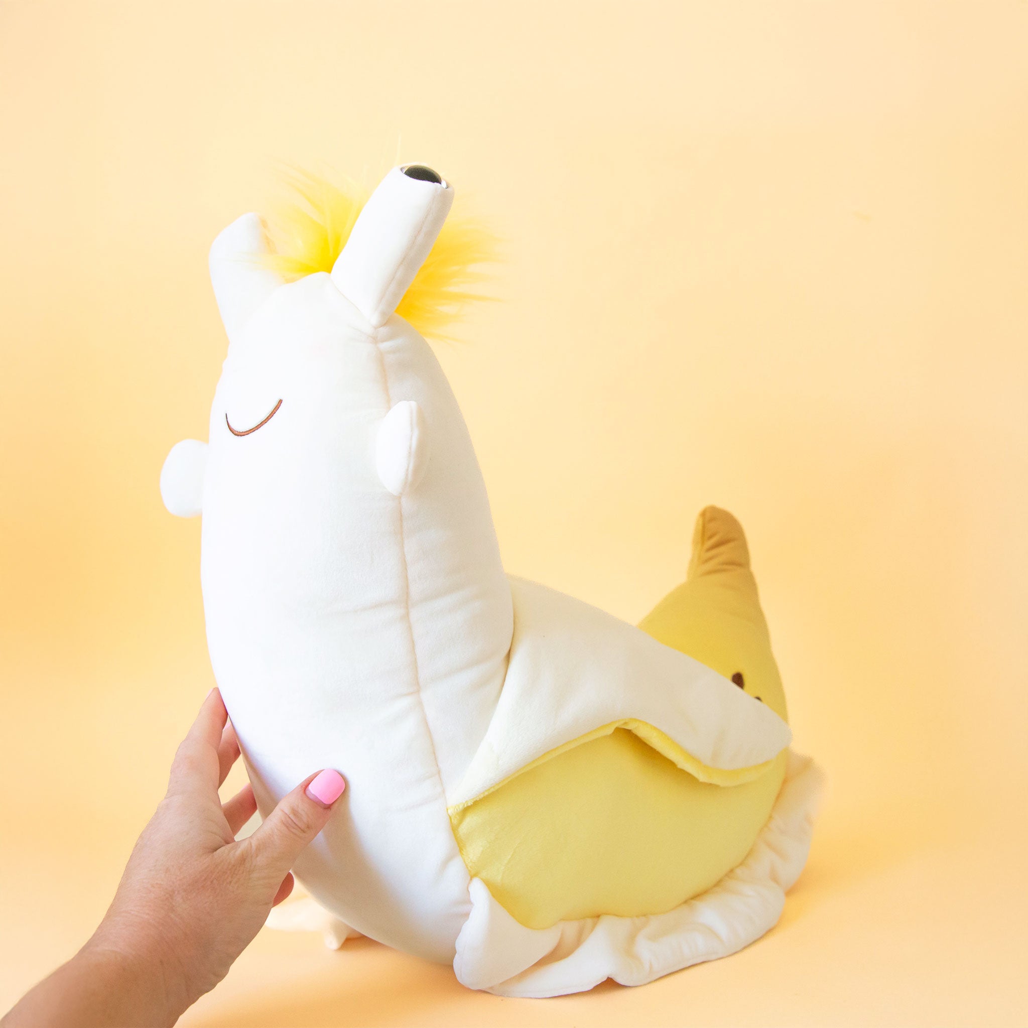 The jumbo version of the banana slug shaped stuffed animal. 