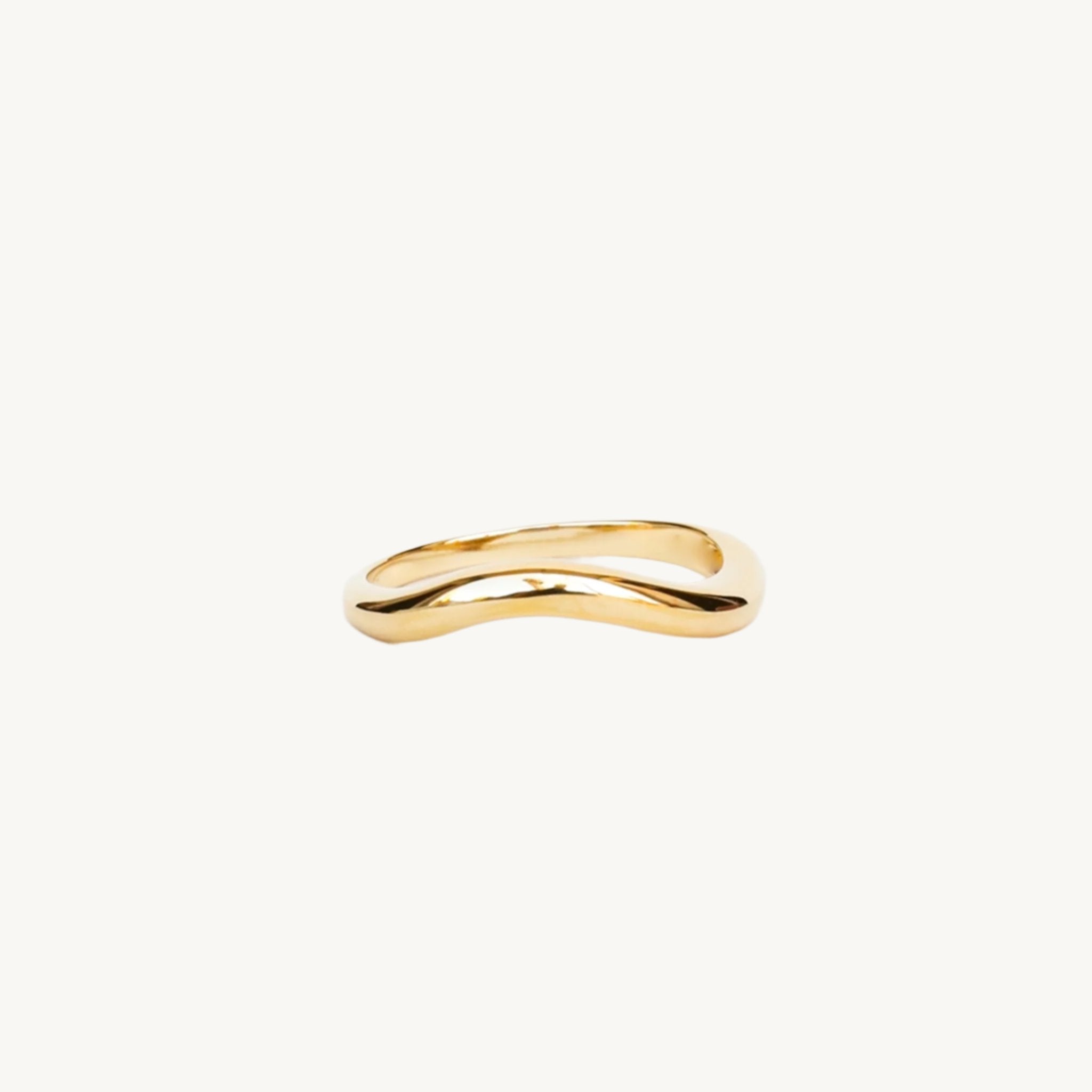 A gold wave ring. 