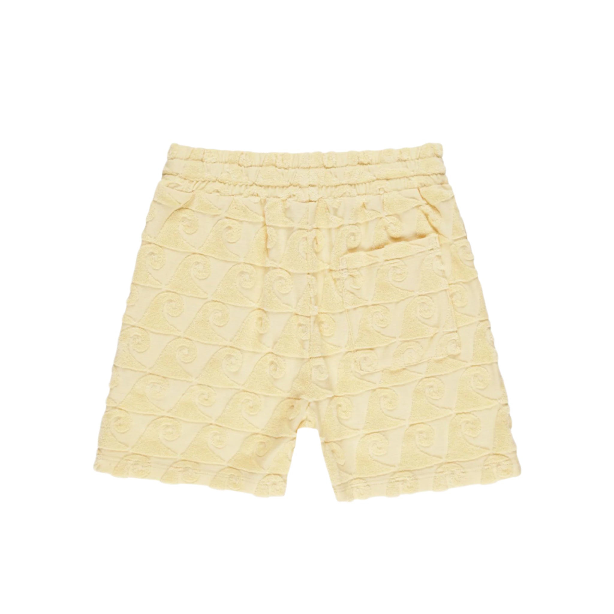 A yellow pair of boardshorts for kids with a textured wave pattern. 