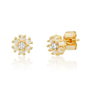 A white floral pair of stud earrings in the shape of flowers made with opal stones and cz stones. 