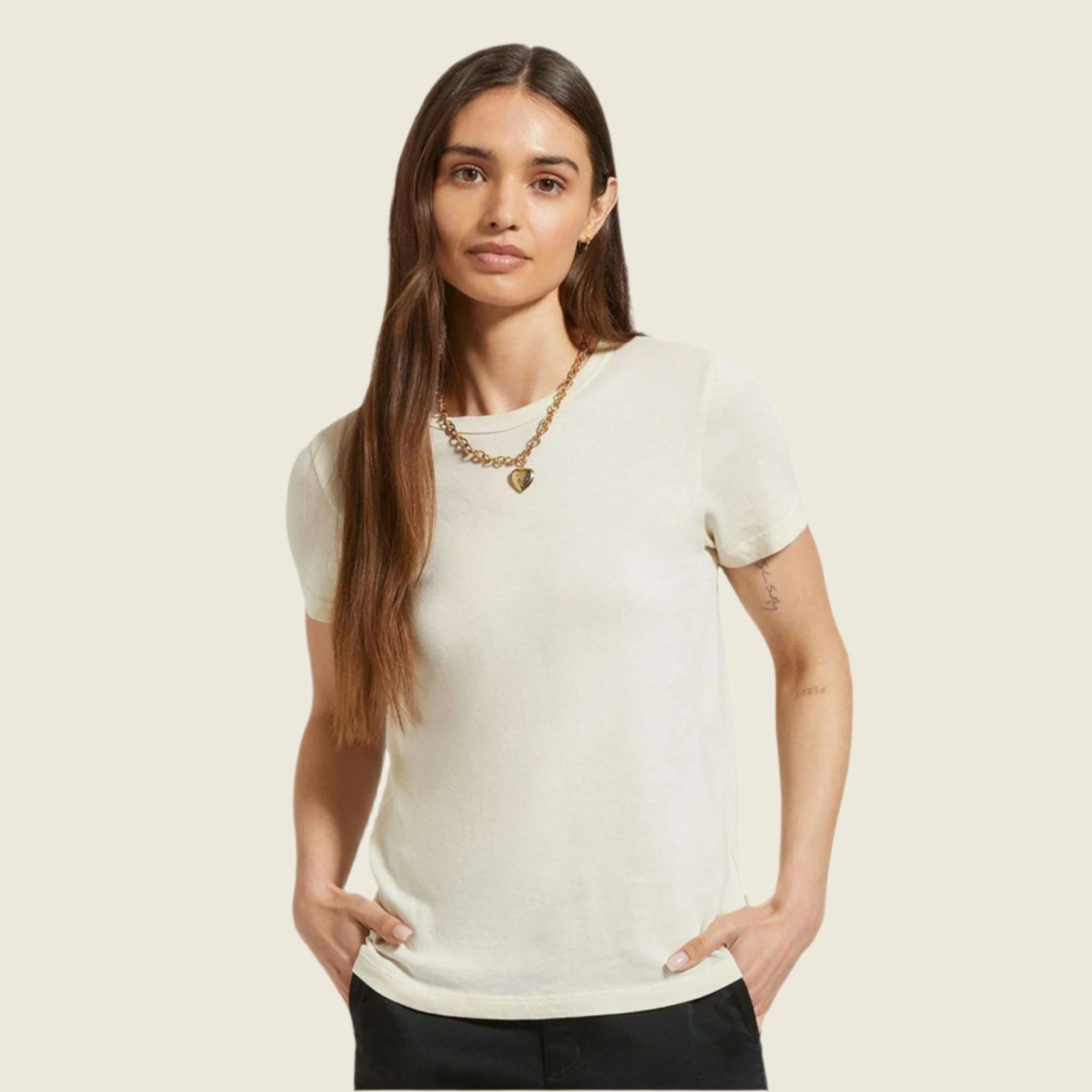 A cream off white t-shirt. 