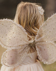 A set of champagne colored costume wings with champagne gold stars and elastic arm bands. 