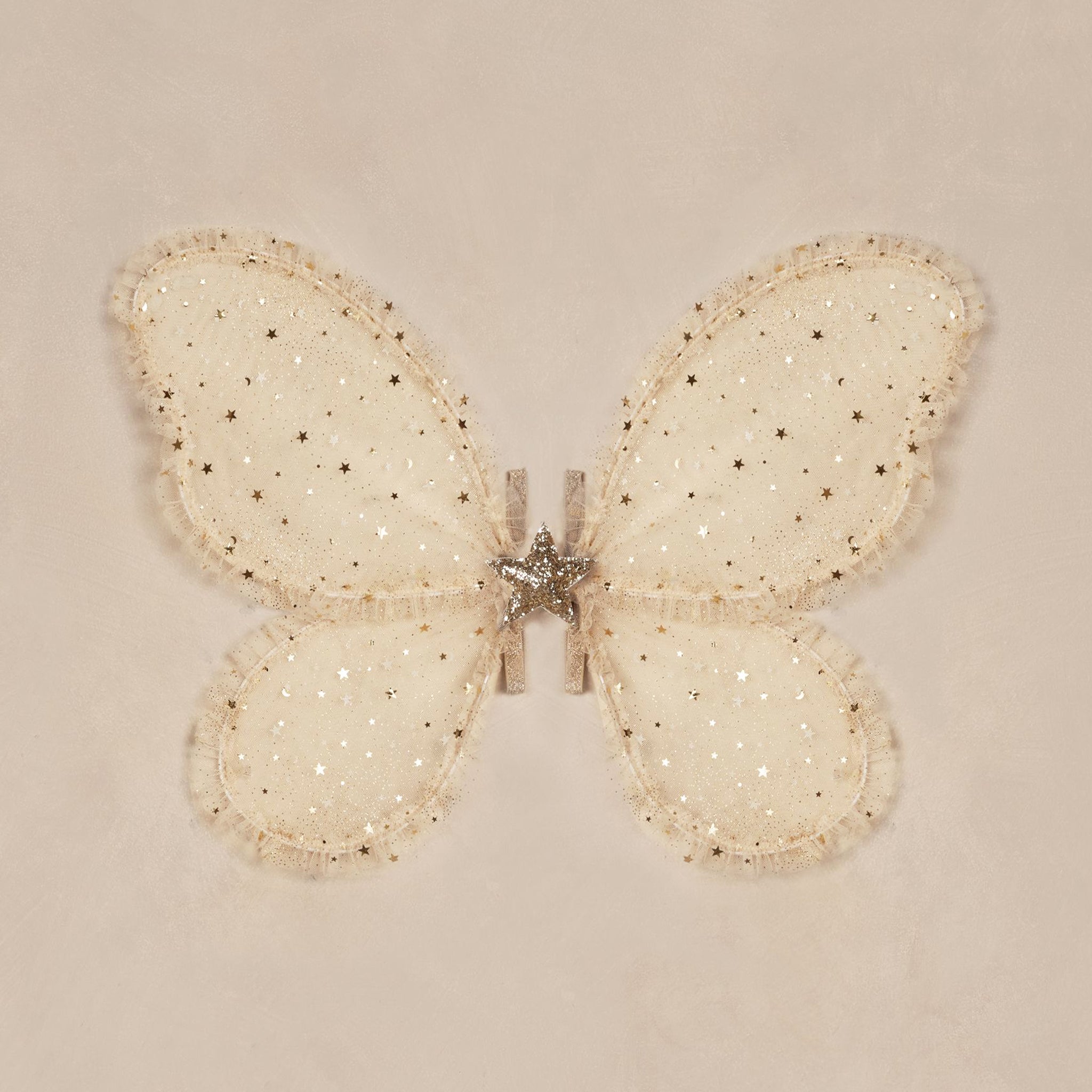 A set of champagne colored costume wings with champagne gold stars and elastic arm bands. 