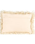 An ivory wool shag lumbar pillow. 