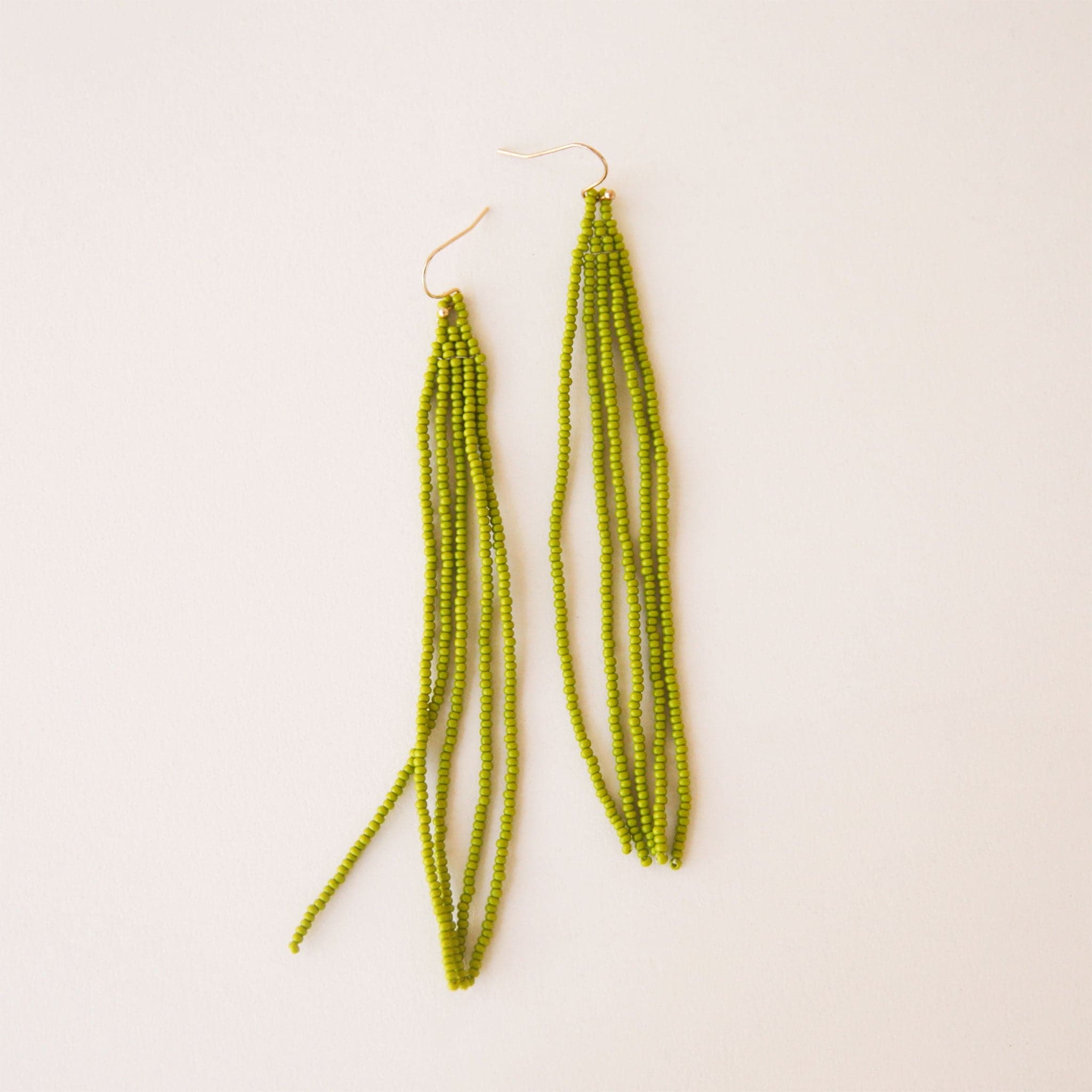 Chartreuse beaded dangly earrings with a hook backing.