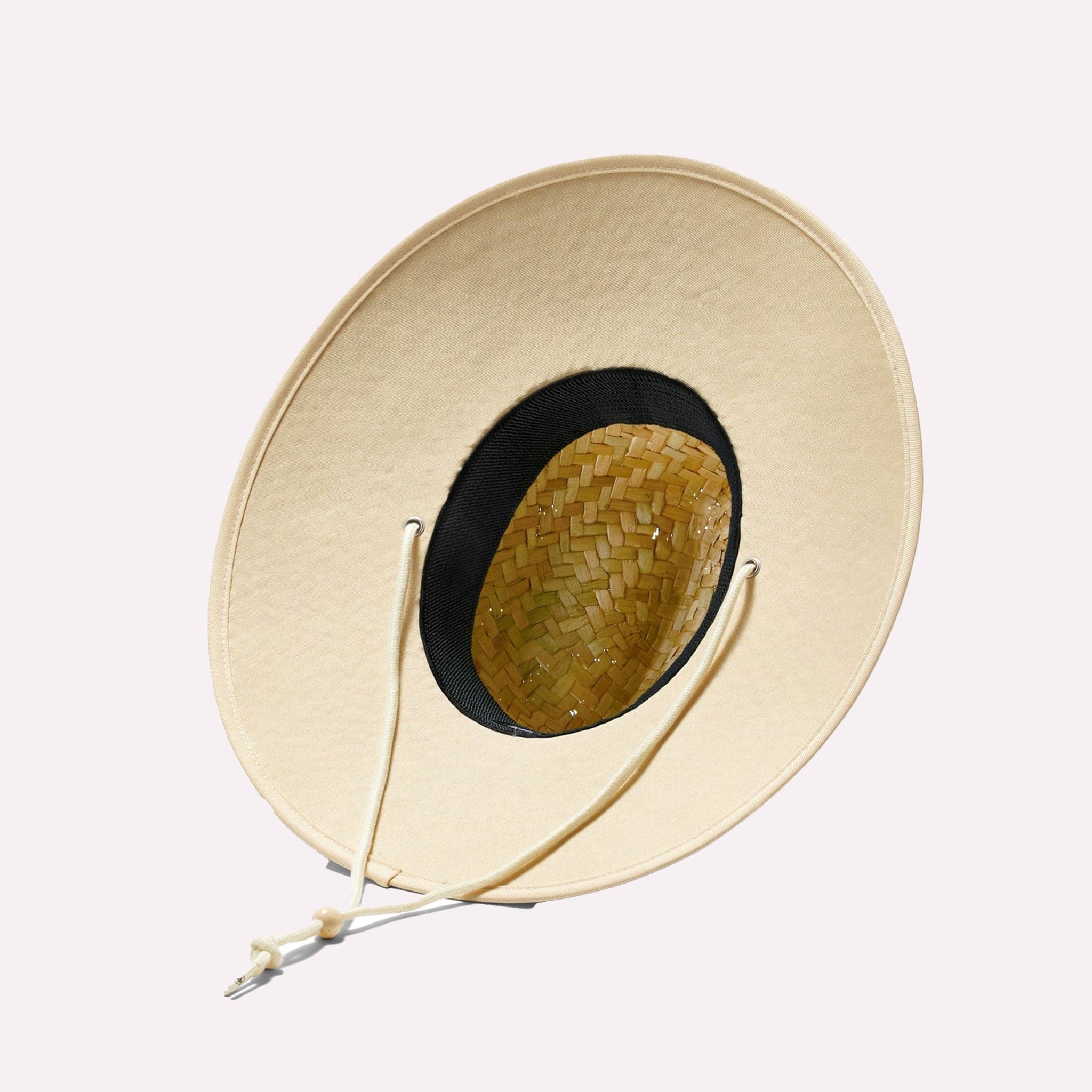 A classic straw hat with a wide brim to protect you from the sunrays! Includes a neutral cream drawstring.