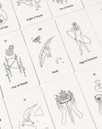 A cream box of 78 Tarot cards with an illustration of two hands and a star in between. All cards are beautifully illustrated with descriptions underneath and detailed with gold foiling.
