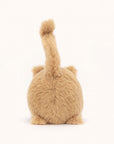 Soft stuffed animal in the shape of a round caramel colored cat with a question mark shaped tail.